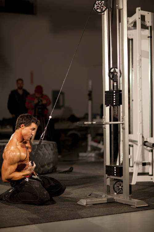 Kneeling Single-Arm High Pulley Row