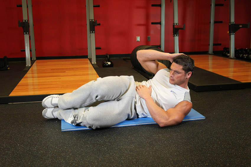 Oblique Crunches - On The Floor