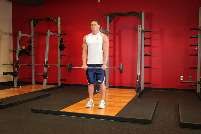 Standing Front Barbell Raise Over Head