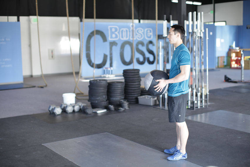 Standing Two-Arm Overhead Throw